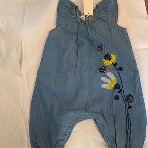 Baby light denim jumpsuit with embroidered flowers